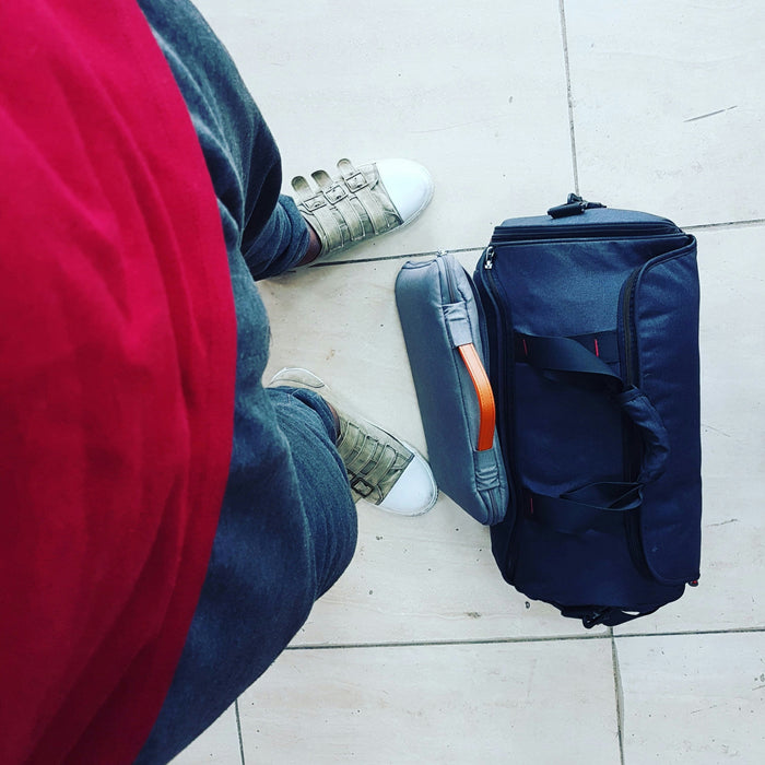 Man in airport with luggage